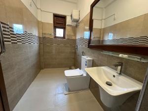 Koupelna v ubytování Emerald Home Stay + 50 fotografií