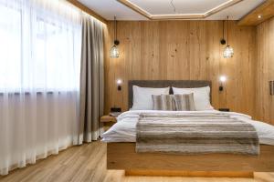 Posteľ alebo postele v izbe v ubytovaní Alpen-Nest Großarl