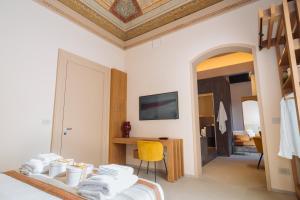 ETNEA Suite 270客房内的一张或多张床位