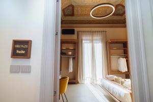 ETNEA Suite 270客房内的一张或多张床位