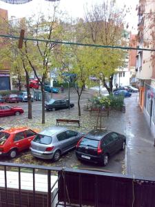 a group of cars parked in a parking lot at Nice apartment. Chamartin. La Vaguada.P Castilla in Madrid