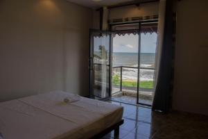 Ένα ή περισσότερα κρεβάτια σε δωμάτιο στο Varinias Beach Villa +18 φωτογραφίες