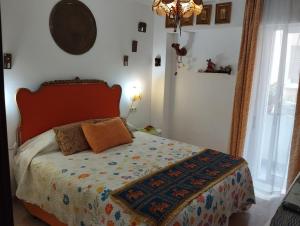 Postel nebo postele na pokoji v ubytování La Casa de La Abuela Rosy