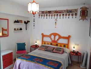 Postel nebo postele na pokoji v ubytování La Casa de La Abuela Rosy