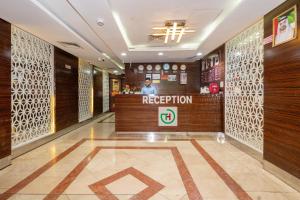 The lobby or reception area at Tanha Hotel