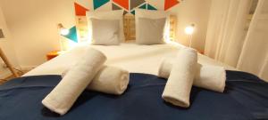 En eller flere senge i et værelse på Chaleureux - Bien équipé - Hypercentre - 2Ch 6pers