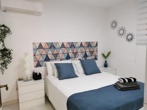Postel nebo postele na pokoji v ubytování Apartamento Albimar + 37 fotografií