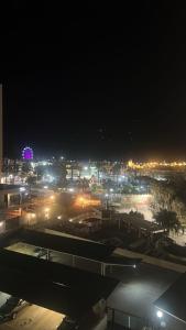 a city lit up at night with street lights at Tamarindo 5 in Benalmádena