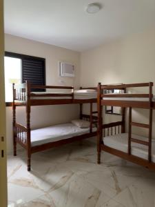 Dviaukštė lova arba lovos apgyvendinimo įstaigoje Cobertura Duplex na Praia Grande - Ubatuba