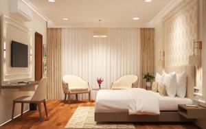 sypialnia z łóżkiem, biurkiem i krzesłami w obiekcie New Hotel Snow Crest w mieście Badrinath