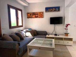 Telewizja i/lub zestaw kina domowego w obiekcie Casa de 5 habitaciones en Cala D'or