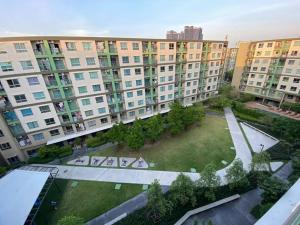 an aerial view of a park in a large building at Garden Oasis Apartment: Condo Near Bangkok River in Ban Sai Ma