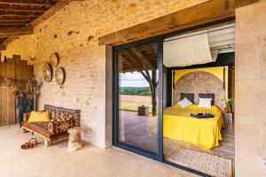 Ένα ή περισσότερα κρεβάτια σε δωμάτιο στο Domaine Villoire +43 φωτογραφίες
