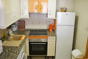 Kuchnia lub aneks kuchenny w obiekcie Sant Pere 139 Apartments