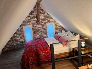 Postel nebo postele na pokoji v ubytování Traumhafte Maisonette-Wohnung im Schwarzwald