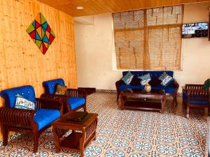 Posezení v ubytování The kempty Boutique Nature Resort, Mussoorie