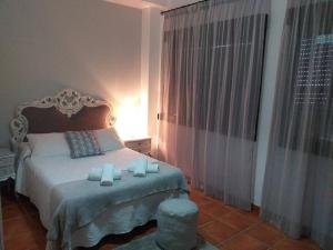 En eller flere senge i et værelse på Casa Rodríguez II - La Herradura + 10 billeder