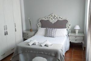 En eller flere senge i et værelse på Casa Rodríguez II - La Herradura