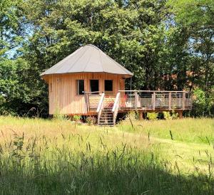 a gazebo in the middle of a field at Le P’tiot Utau in Chapelle-Voland