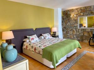 Postel nebo postele na pokoji v ubytování Competa Suites