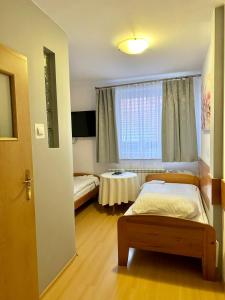 Łóżko lub łóżka w pokoju w obiekcie Motel Za Miedzą