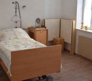 Кровать или кровати в номере Ferienwohnung Goldener Löwe
