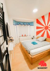 a bedroom with a bed with a flag on the wall at Ganze Monteurwohnung zum Entspannen in Bremen