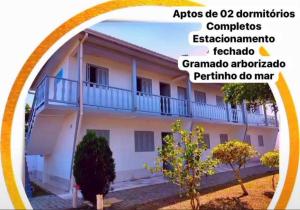a picture of a building with the words dstg dstg at Pousada Pé na Praia in Imbé