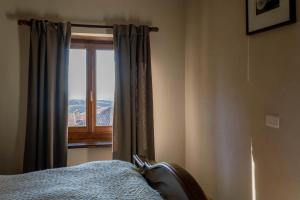 Postel nebo postele na pokoji v ubytování Number 10 Locanda B&B