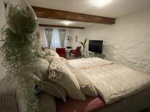 Ένα ή περισσότερα κρεβάτια σε δωμάτιο στο Escape Private SPA II