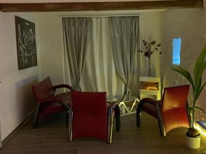 Χώρος καθιστικού στο Escape Private SPA II