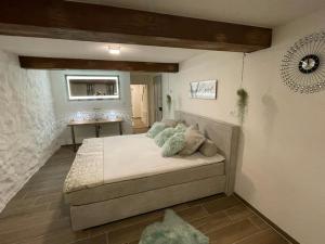 Ένα ή περισσότερα κρεβάτια σε δωμάτιο στο Escape Private SPA II
