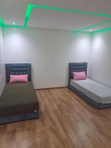 Cama ou camas em um quarto em Appart Riad garden