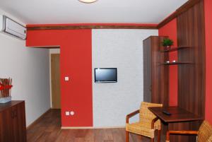 TV a/nebo společenská místnost v ubytování Vinařství Pastorek