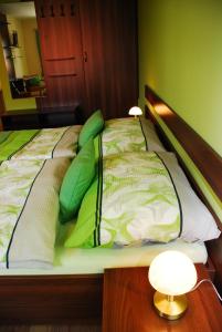 Postel nebo postele na pokoji v ubytování Vinařství Pastorek