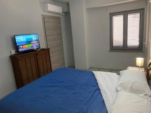 Postel nebo postele na pokoji v ubytování La casa di Cate & Adry