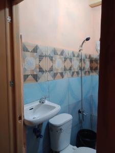 Ένα μπάνιο στο CHARM'S DE ALBIA GUEST HOUSE