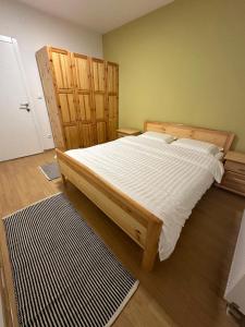 Postel nebo postele na pokoji v ubytování Apartman Hedonija Jahorina