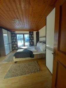 Postel nebo postele na pokoji v ubytování Mani‘s Appartements + 26 fotografií
