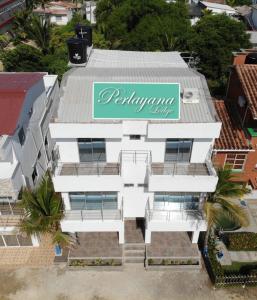 an aerial view of a building with a sign on it at Mi Paraíso de Playa Blanca in San Antero