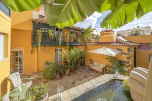 a house with a swimming pool in the yard at Hotel San Telmo in Santa Cruz de la Palma +95 photos