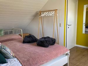 Postel nebo postele na pokoji v ubytování Le Gîte de l'espace bien être