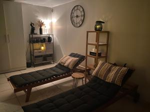 Posezení v ubytování Le Gîte de l'espace bien être