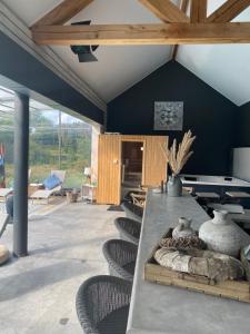 Posezení v ubytování Le Gîte de l'espace bien être
