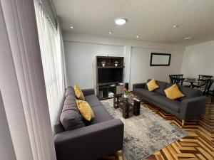 Χώρος καθιστικού στο VIVE Apartments Cusco