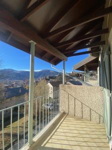 a balcony with a view of the mountains at Appartement au cœur de Seyne in Seyne