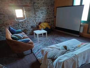 Lova arba lovos apgyvendinimo įstaigoje Gîte Groupe La Farigoule à Siguer