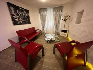Χώρος καθιστικού στο Escape Private SPA II