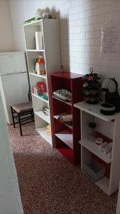 Η κουζίνα ή μικρή κουζίνα στο Del Borgo Rooms - Self Checkin H24