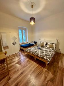 Ένα ή περισσότερα κρεβάτια σε δωμάτιο στο RESIDENCE ZAR 4
